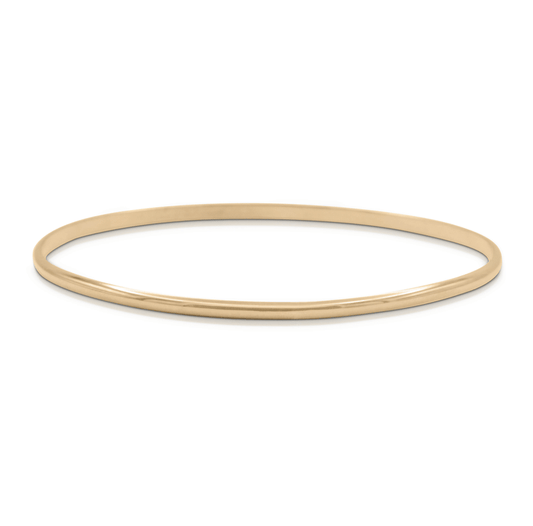 Round-shaped gold thin bangle bracelet on white background