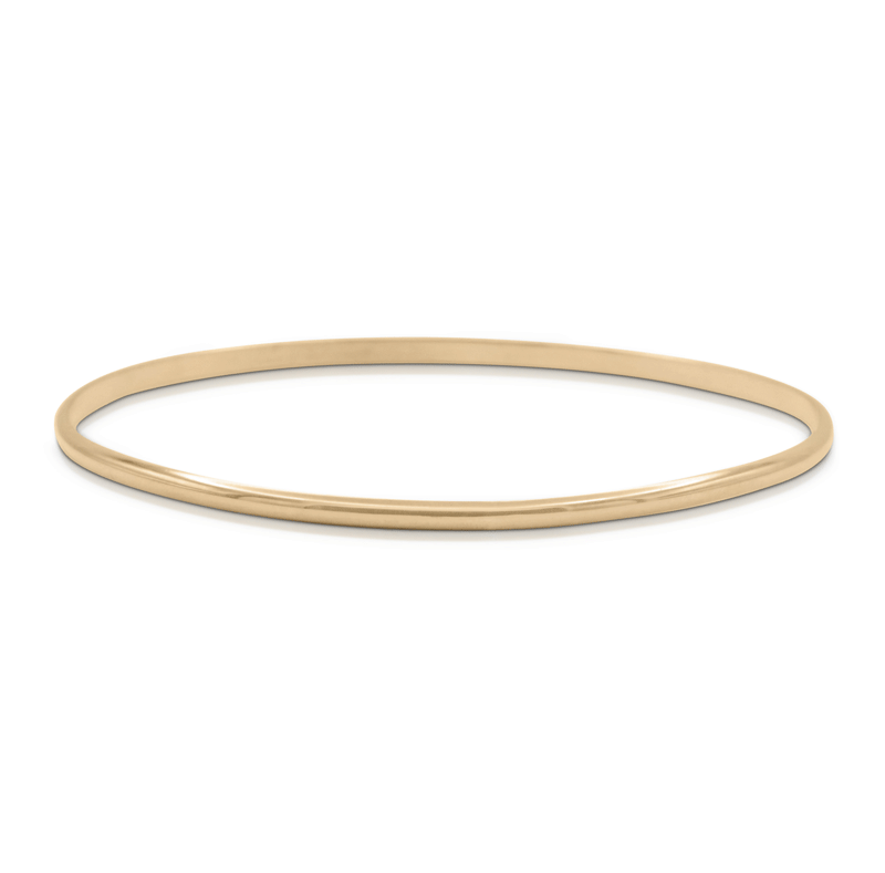 Round-shaped gold thin bangle bracelet on white background