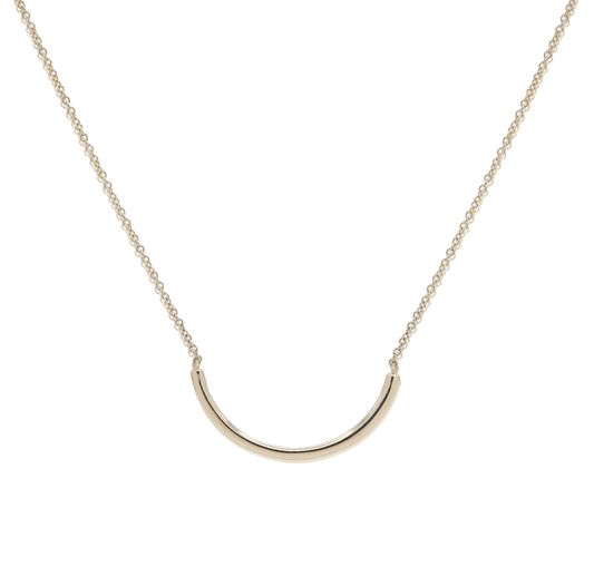 Gold thin necklace with a gold u-shaped pendant