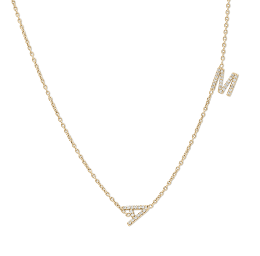Delicate gold chain necklace with spaced initial letters with diamonds